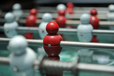 Table Football with Red and White Players